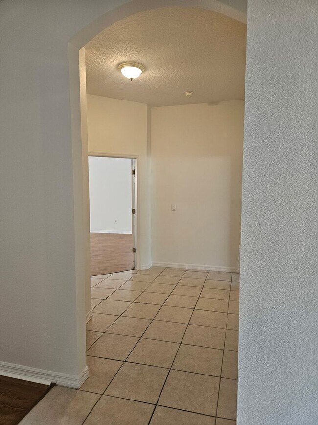 Building Photo - 4 BEDROOM 3 FULL BATH HOME WITH A SCREENED IN POOL IN THE BEAUTIFUL PALM COAST