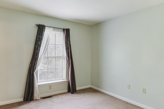 Building Photo - Three bedroom two and a half bathroom town...