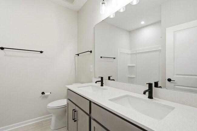 Building Photo - Like-New LoSo Townhome | 3BR + Loft | 2-Car Garage | Move-In Ready