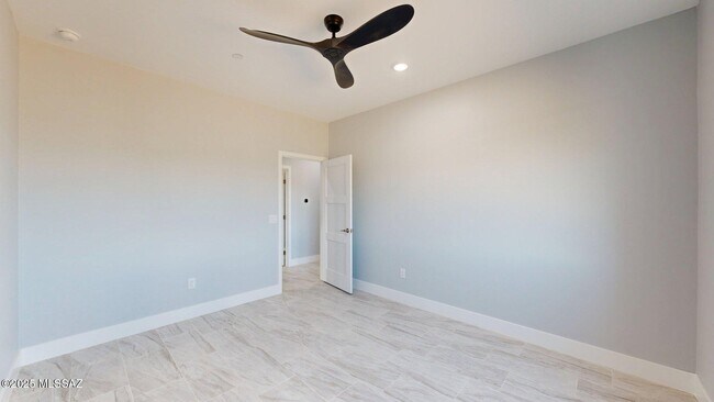 Building Photo - 7095 W Los Reales Rd