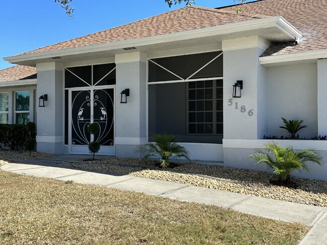 Building Photo - "Spacious 4-Bedroom 2 bathroom pool home"