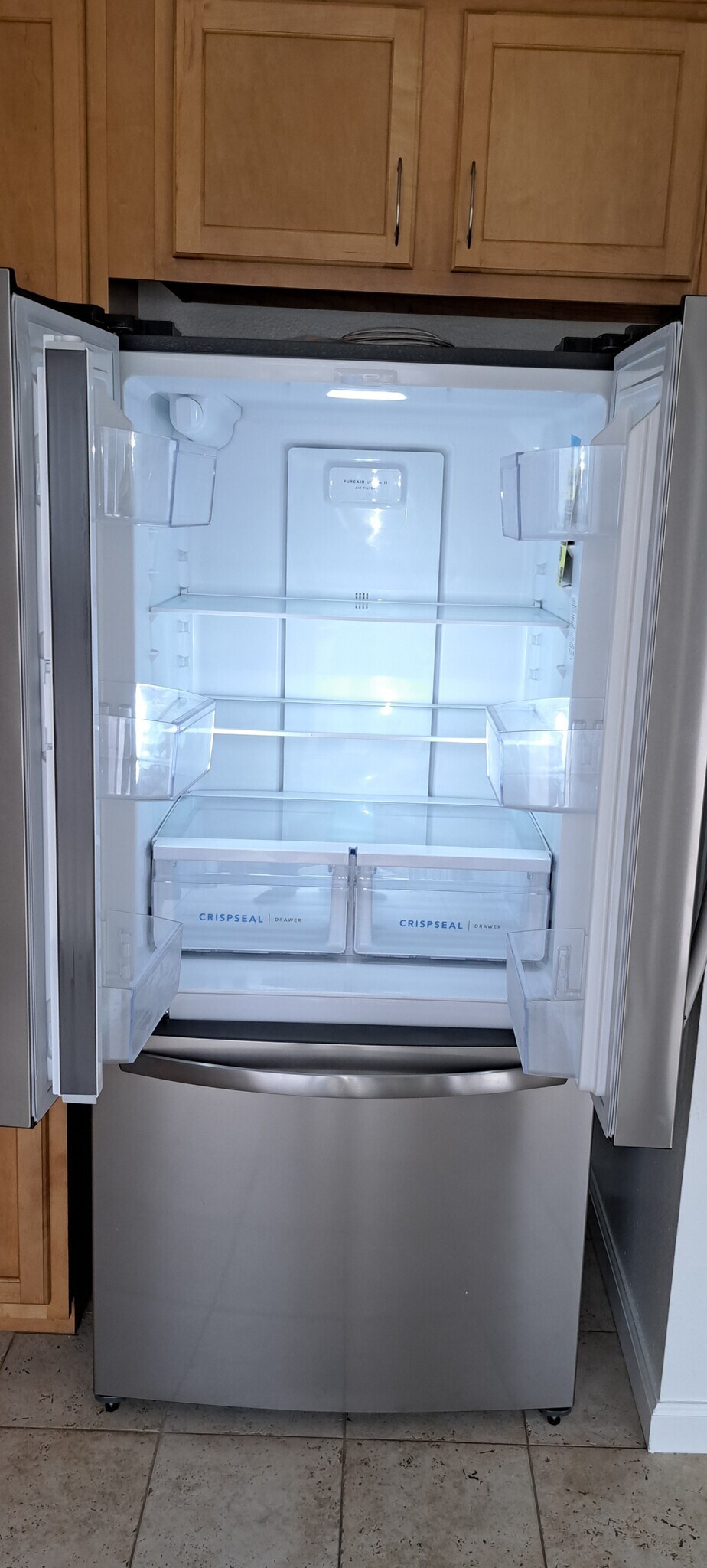 Inside of new refrigerator with french doors - 314 20th St