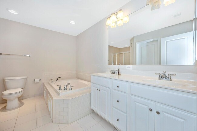 Building Photo - Desirable Two Level Condo For Lease - Not Pet Friendly