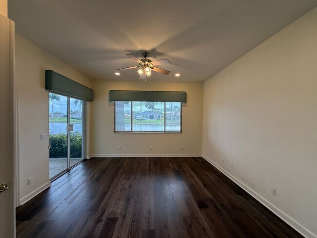 Building Photo - Luxurious 4 Bedroom 3 Bath Lakefront Pool Home W/3-Car Garage