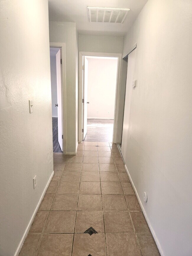 Building Photo - FIRST FLOOR LIVING WITH OPEN KITCHEN, DEN & CARPORT – GCU ACCESS