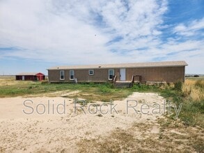 Building Photo - 9835 N Log Rd
