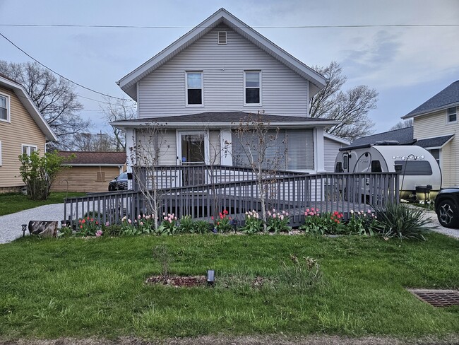 Front of house, driveway on either side - 4047 Mogadore Rd