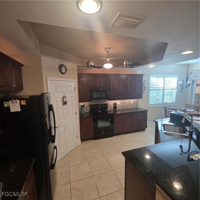 Building Photo - 10637 Pelican Preserve Blvd