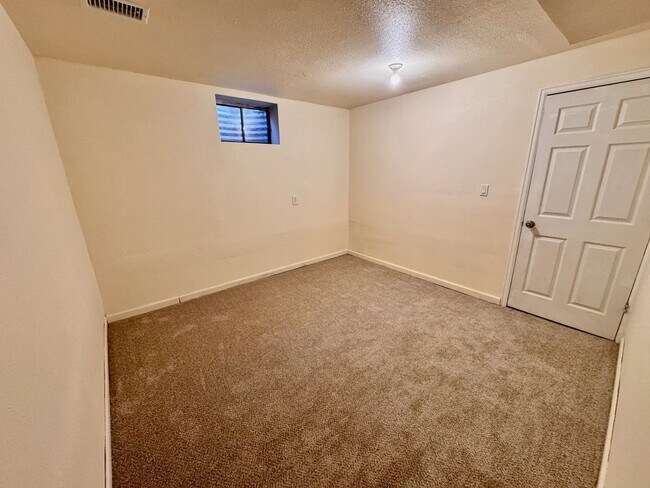 Building Photo - Move-In Ready 4BR Home with Finished Basement, Flex Space & Large Yard