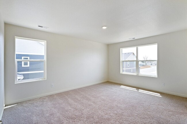 Building Photo - Spacious 4-Bedroom Wellington Home with 3-Car Garage, Loft & Fenced Backyard!