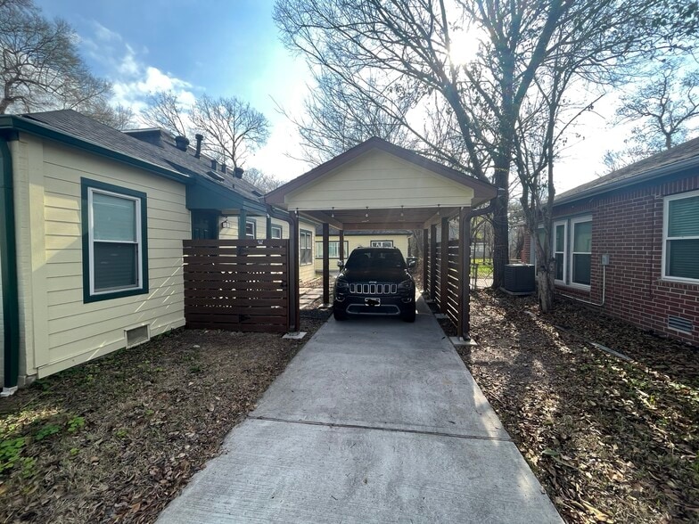Custom carport provides privacy for guest house from the street - 4388 Varsity Ln