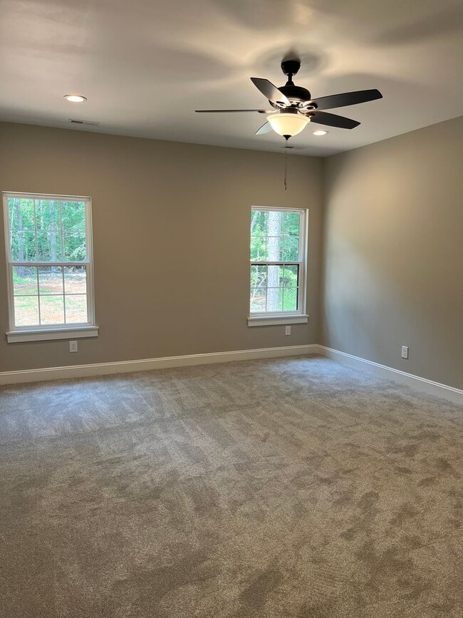 Building Photo - Three bedroom, 2.5 bath newly constructed ...