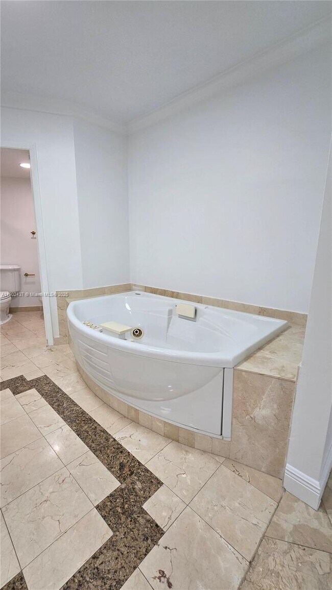 Building Photo - 19333 Collins Ave