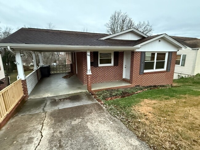 Building Photo - Updated 4BR Home with Finished Basement & Level Yard