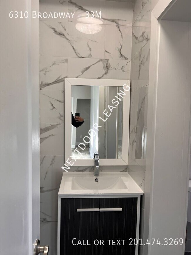 Building Photo - 6310 Broadway-33M