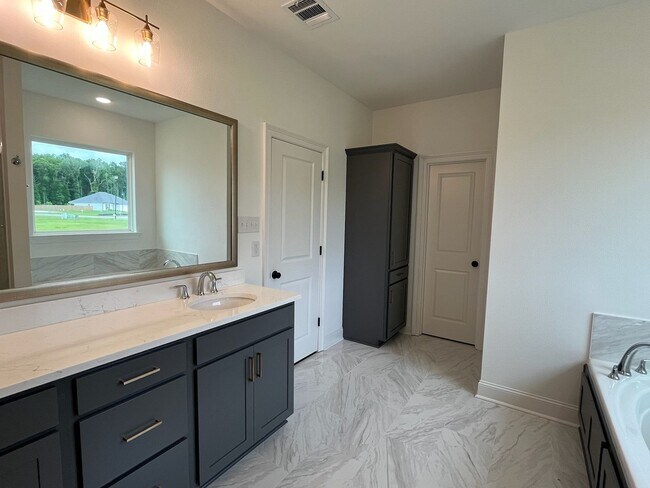 Building Photo - Beautiful new construction in Watson!