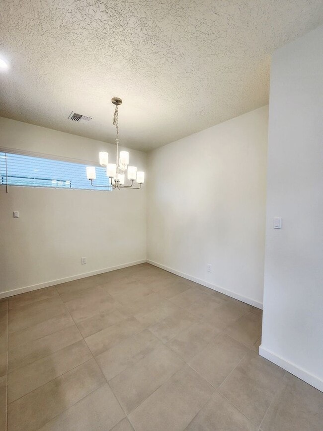 Building Photo - Brand-New Construction Townhome – Never Li...