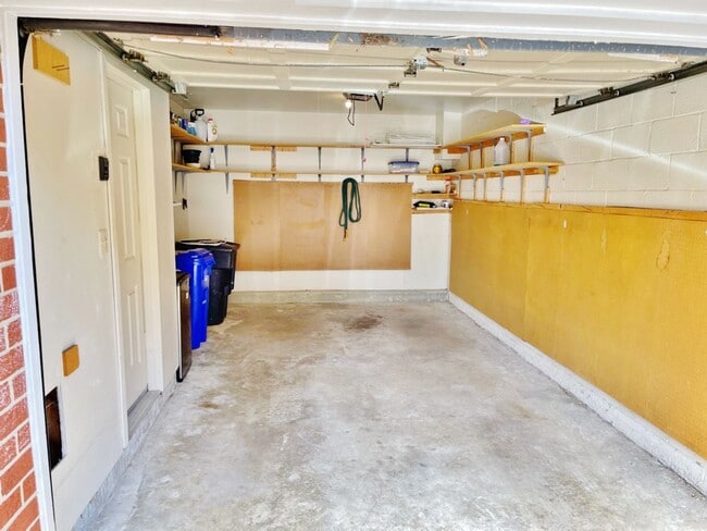 Building Photo - Updated, all brick 3 level townhouse pet friendly townhouse for rent!