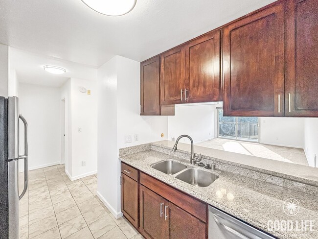 Building Photo - Bright 2BR Condo with New Carpet, Private Balcony & Great Amenities in Clairemont Mesa! $500 off ...