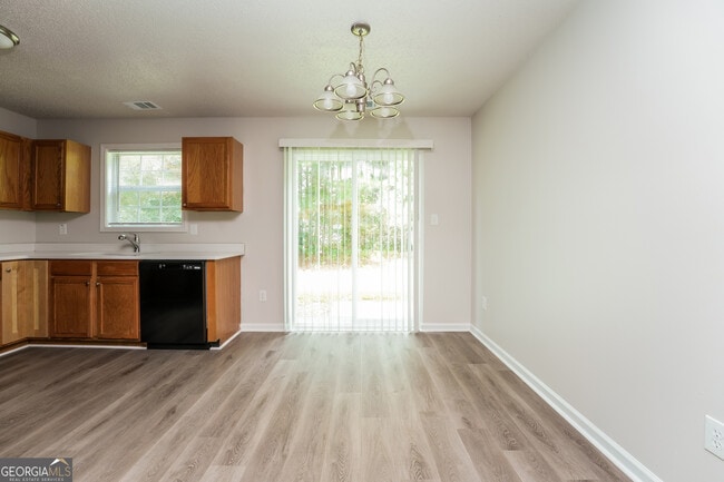 Building Photo - 6930 Red Bone Way