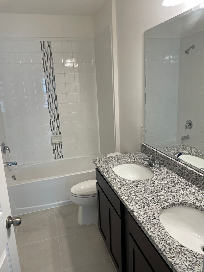 Building Photo - Brand New 4 bedroom 2 bath home - corner lot