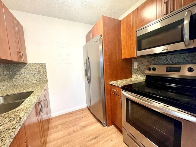 Building Photo - 7415 SW 152nd Ave