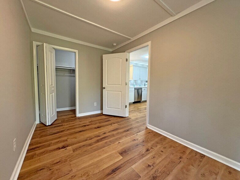 Bedroom 1 Closet and Entrance to Kitchen / Den - 7942 New Hope Rd
