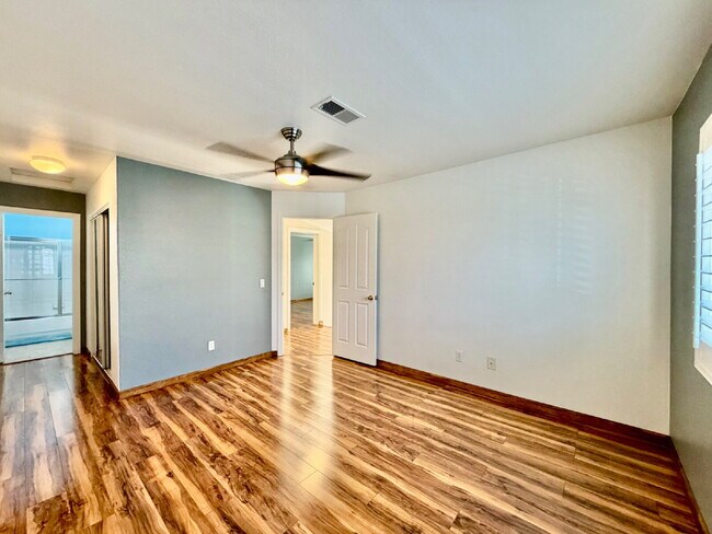 Building Photo - UPGRADED 2 BEDROOM TOWNHOME | SOLAR + PRIVATE YARD | SILVERADO RANCH / HENDERSON