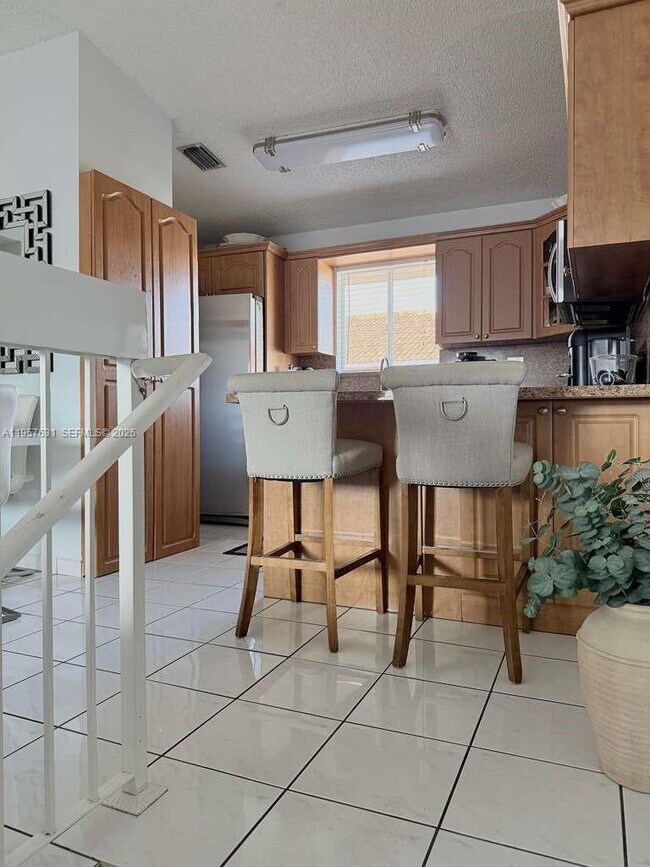 Building Photo - 10017 W Okeechobee Rd