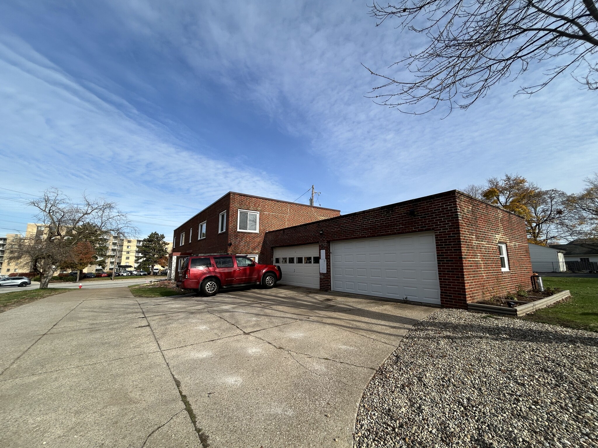 New garage doors have been installed since this photo was taken - 20041 Lorain Rd