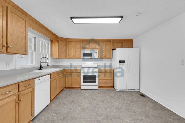 Building Photo - Fully Renovated 3-Bedroom Home in Cherokee 01 School District—Convenient Access to Interstates & ...