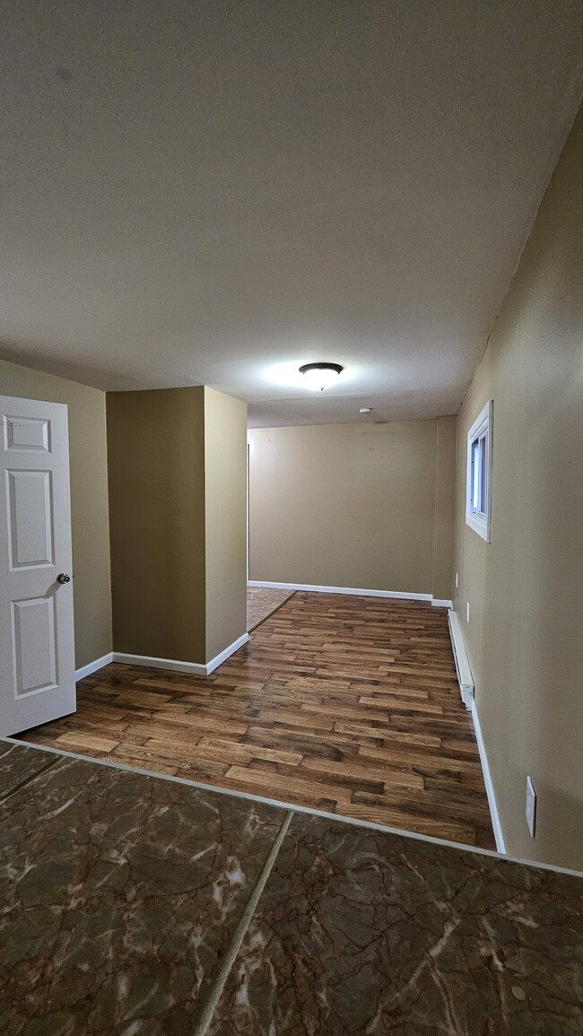 Looking back dining room - 114 W Oneida St