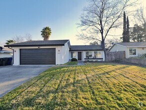 Building Photo - Stunning 4-Bedroom Home with Pool, Covered...