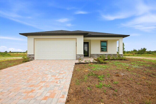 Building Photo - New Construction 3/2 Pool Home on Canal, $2,699, NW Cape Coral. The Only Thing Used Here Is the W...