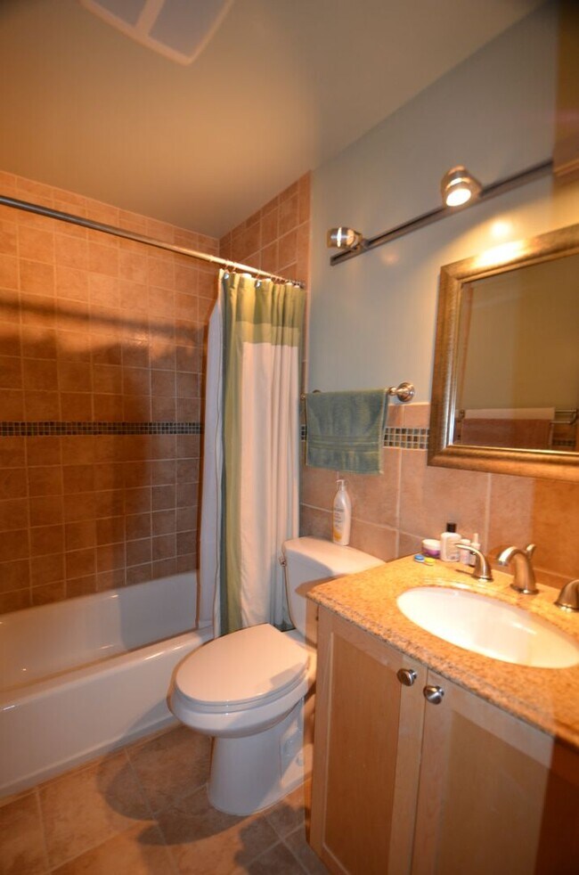 Building Photo - Pets Negotiable!  Walk to town, community hot tub! 2 month lease!