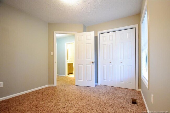 Building Photo - 6933 Woodmark Dr