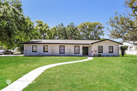 Building Photo - Bright 4-Bedroom Home