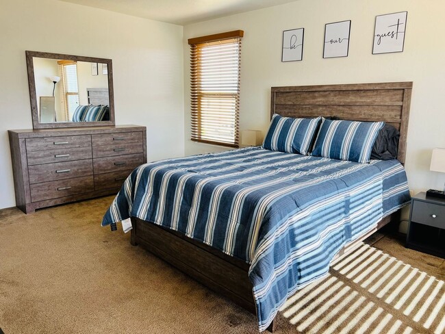 Building Photo - Furnished monthly rental home with all uti...