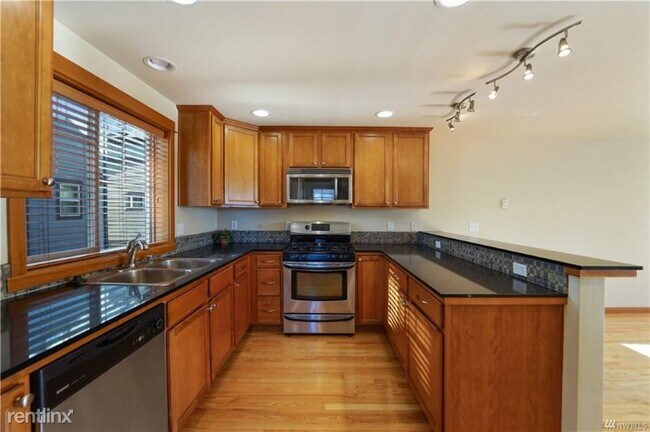 Building Photo - 11036 8th Ave NE