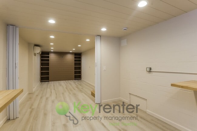 Building Photo - Modern 2-Bedroom Gem with Garage, Shed, an...