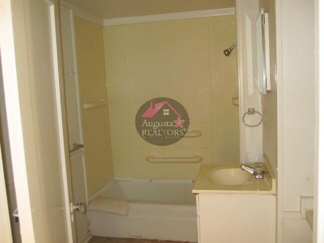 Building Photo - Three