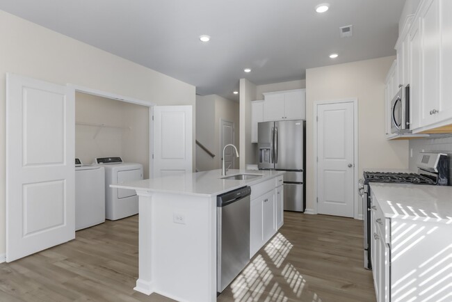 Building Photo - Brand-New 4-Bedroom/3-Full Bathroom Townho...