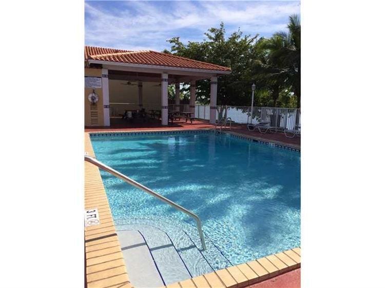 Building Photo - 7090 NW 173rd Dr