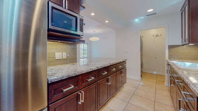 Kitchen & laundry room... - 18406 Bessemer St