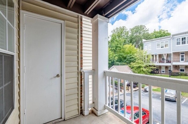 Building Photo - Spacious 2-Bedroom Elite Apartment with Private Balconies & Washer/Dryer