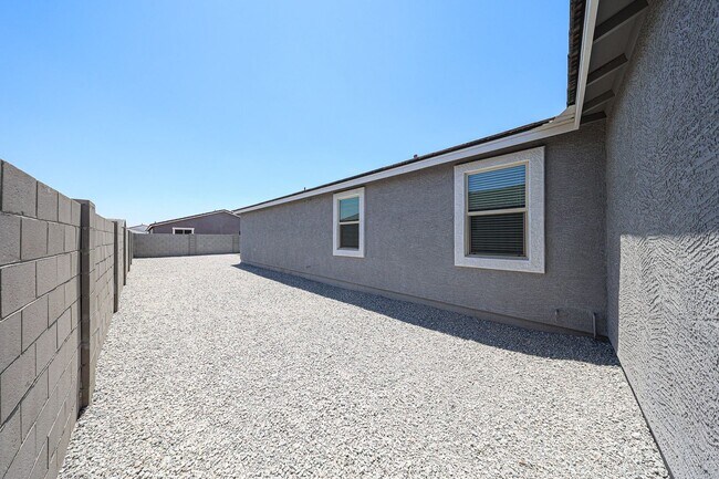Building Photo - Modern Mountainside Living: Stunning New 4-Bedroom Home in Estrella Crossing! 3 CAR GARAGE!