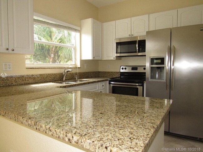 Building Photo - 14030 SW 51st Ln