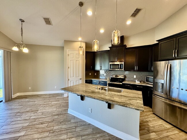 Building Photo - K-Bar range gated 3-Bed Single Family House newly renovated with Fenced back yard