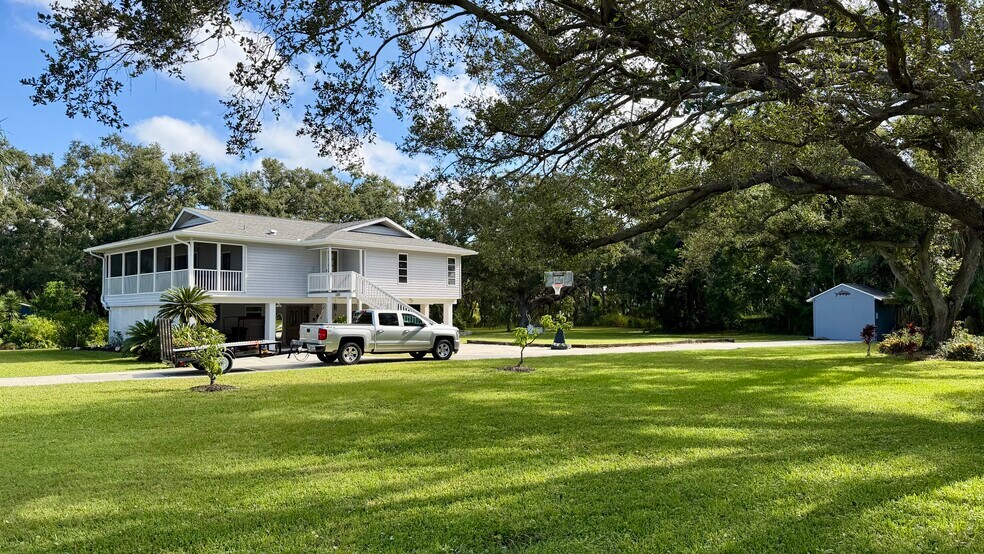 Property is on a double lot which provides a spacious side yard. - 5203 15th St W