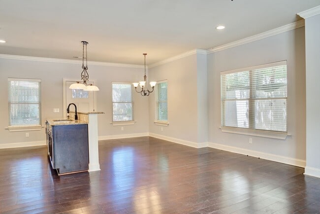 Building Photo - Heisman Villas: End Unit with Parking & Pr...